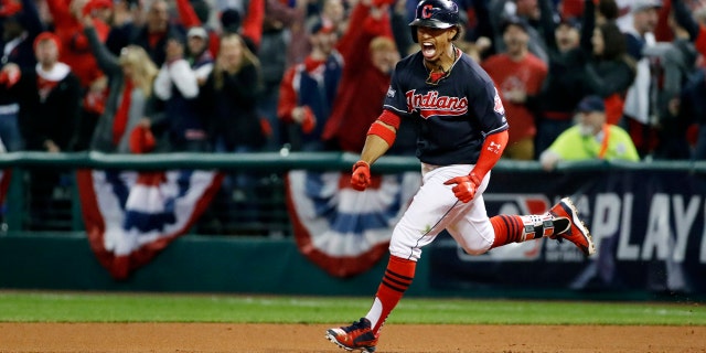 Cleveland Indians' Francisco Lindor rounds the bases on his two-run home run against the Toronto Blue Jays during the sixth inning in Game 1 of baseball's American League Championship Series in Cleveland, Friday, Oct. 14, 2016.(AP Photo/Gene J. Puskar)