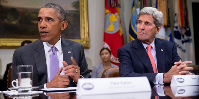 FILE - September 10, 2015: President Obama, along with Secretary of State John Kerry, meets with veterans and Gold Star Mothers to discuss the Iran Nuclear Deal, in the Roosevelt Room of the White House in Washington.