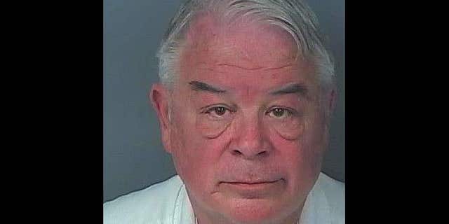 Commissioner Nick Nicholson, 71, was booked into Hernando County Detention Center on charges relating to prostitution, authorities say.