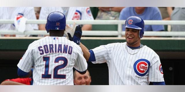 Alfonso Soriano and Aramis Ramirez. (Photo by Christian Petersen/Getty Images)