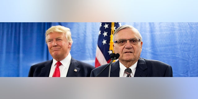 FILE - In this Jan. 26, 2016 file photo, then-Republican presidential candidate Donald Trump was joined by Joe Arpaio, the sheriff of metro Phoenix, during a news Trump was just a few weeks into his candidacy in 2015 when came to Phoenix for a speech that ended up being a bigger moment in his campaign than most people realized at the time. And now Trump is coming back to Arizona at another crucial moment in his presidency. (AP Photo/Mary Altaffer, File)