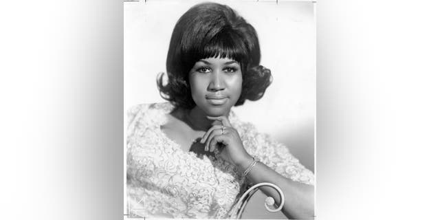 Aretha Franklin poses for a photo in 1960.