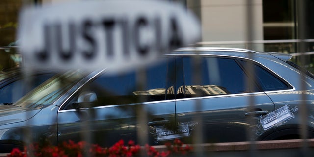 Vehicle impoundment notices are taped to the car of the late prosecutor Alberto Nisman, parked at Le Parc Tower, where Nisman lived on the 13th floor of the luxury condo, in Buenos Aires, Argentina, Thursday, Jan. 22, 2015. Argentine President Cristina Fernandez made an about-face Thursday, saying she now is âconvincedâ that Nismanâs death was not a suicide just days after she suggested the man who accused her of a cover-up in the nationâs worst terrorist attack had killed himself. (AP Photo/Rodrigo Abd)