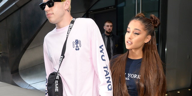 Ariana Grande and Pete Davidson are seen walking in Midtown on July 11, 2018 in New York City.