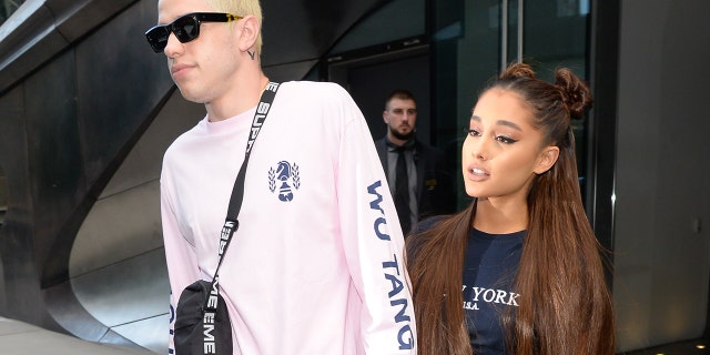 Ariana Grande and Pete Davidson are seen walking in Midtown on July 11, 2018 in New York City.