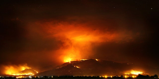 The Frye Fire burns the western edge of the Pinaleño Mountains in Coronado National Forest above Ft. Grant Prison near Willcox, Ariz. on Thursday, June 22, 2017.