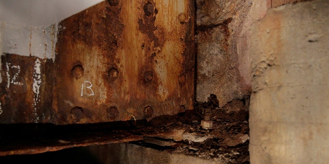 The bridge is literally coming apart – its interior posts are rusting away.