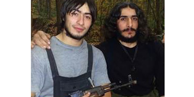 This photo, provided by MEMRI, shows Armiev Artur, left, one of the ISIS members the female Russian spy helped to kill, according to the terror network.