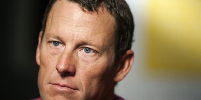 Feb. 15, 2011: In this file photo, Lance Armstrong pauses during an interview in Austin, Texas.