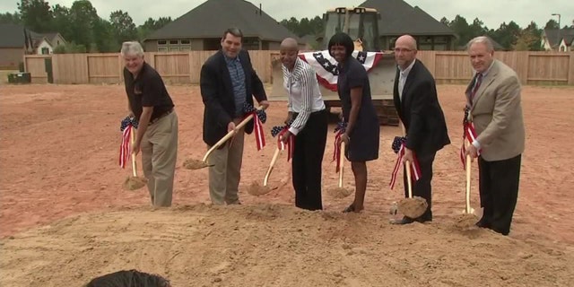 Medically-retired U.S. Army Sergeant Demitra Jarrett couldn't contain her tears after learning she was being gifted with a home.
