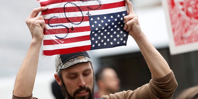 A pro-illegal immigrant protester in San Francisco, where authorities reportedly let ICE agents interview an inmate earlier this month.
