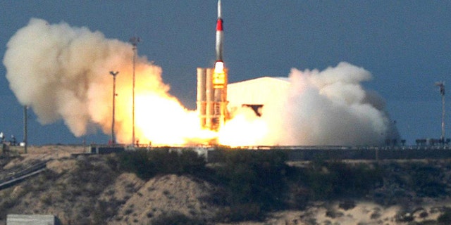 This file photo, taken on Friday Dec. 2, 2005, released by Israel Aircraft Industries Ltd., shows an Arrow missile being launched at an undisclosed location in Israel. Israel and the U.S. conducted a joint missile test over the Mediterranean on Tuesday, Sept. 3, 2013, an apparent display of military prowess as the Obama administration seeks congressional support for strikes against the regime of Syrian President Bashar Assad. A Sparrow missile was launched successfully at 9:15 a.m. and followed its planned trajectory. The Arrow missile defense system successful detected and tracked the target, the ministry said.