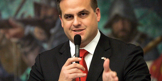 FILE - This March 9, 2012, file photo shows Republican state senator Frank Artiles, R-Miami, asking a questions about a pip insurance bill during house session in Tallahassee, Fla. Artiles, a Republican state senator, is expected to apologize publicly Wednesday April 19, 2017, for using racial slurs and obscene insults in a private after-hours conversation with African-American colleagues. (AP Photo/Steve Cannon, File)