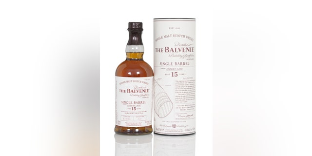 Bottle and tube of a single malt whisky from the highlands: distilled by the distillery Balvenie in Scotland, United kingdom. The whisky is a single barrel filling from an sherry cask and is 15 years old