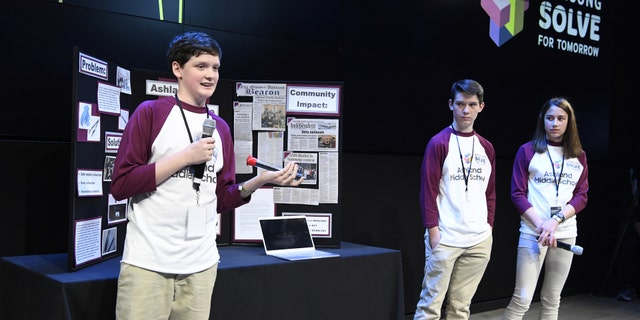 Students (left to right) Isaac Campbell, Caleb Campbell and Aubree Hay from Ashland Middle School in Ashland, KY present their STEAM project to a panel of judges at the Samsung Solve for Tomorrow national finalist pitch event on Monday, April 9, 2018 in New York City. The students created a device that allows first responders to safely collect hazardous hypodermic needles (Samsung)