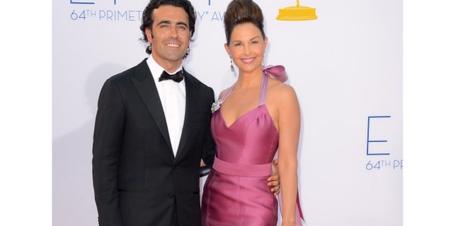 LOS ANGELES, CA - SEPTEMBER 23: Actress Ashley Judd (R) and guest arrive at the 64th Annual Primetime Emmy Awards at Nokia Theatre L.A. Live on September 23, 2012 in Los Angeles, California. (Photo by Frazer Harrison/Getty Images)