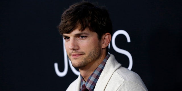 Ashton Kutcher handled a protester at a Airbnb in Los Angeles.