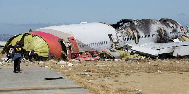 July 7, 2013: This U.S. National Transportation Safety Board (NTSB) photo shows the wreckage of Asiana Airlines Flight 214 that crashed at San Francisco International Airport in San Francisco, California.