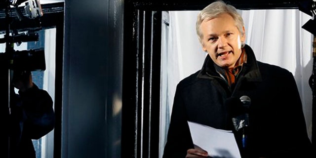 In this Thursday, Dec. 20, 2012, file photo, Julian Assange, founder of WikiLeaks speaks to the media and members of the public from a balcony at the Ecuadorian Embassy in London. (AP Photo/Kirsty Wigglesworth, File)