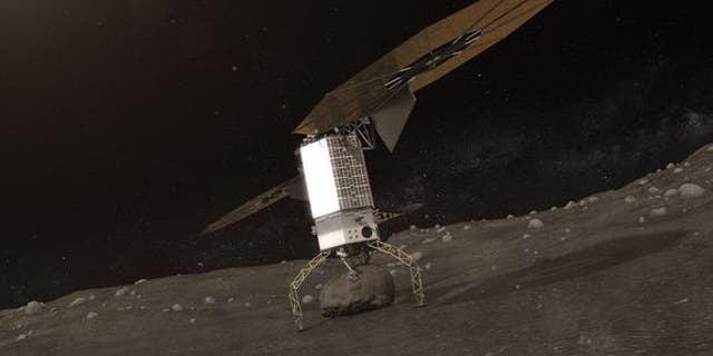 Artist's concept showing a robotic spacecraft grabbing a boulder off a near-Earth asteroid. NASA's Asteroid Redirect Mission aims to haul such a boulder to lunar orbit by 2025.