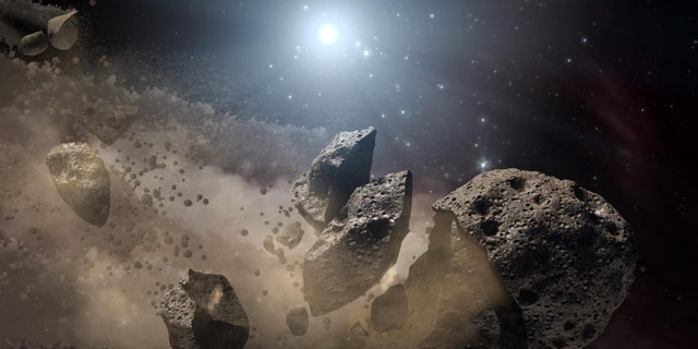 Image courtesy of NASA shows an artist's concept of a broken-up asteroid. (REUTERS/NASA/JPL-Caltech/Handout)