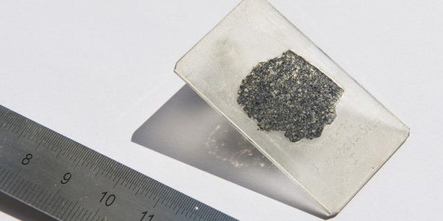 Scientists analyzed a slice of the meteorite fragment (© 2018 EPFL / Hillary Sanctuary)
