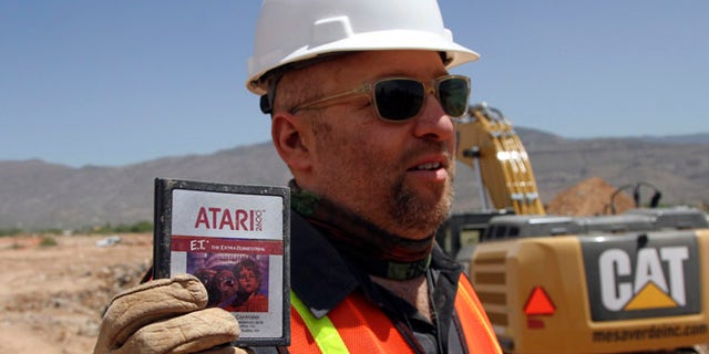 Apr. 26, 2014: Film Director Zak Penn shows a box of a decades-old Atari 'E.T. the Extra-Terrestrial' game found in a dumpsite in Alamogordo, N.M.