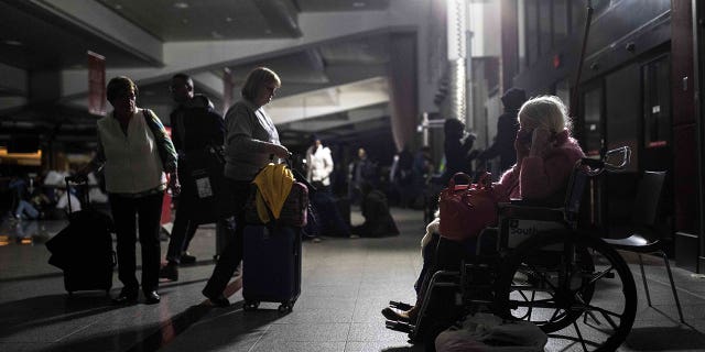 Some passengers said wheelchair-bound passengers were especially 'helpless,' and that airport staff had to carry them up and down stairs.