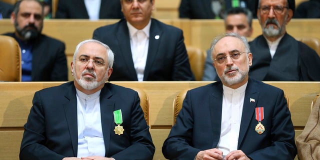 Foreign Minister Mohammad Javad Zarif and Iran's Atomic Energy Organization Ali Akbar Salehi were awarded the medal of honor by President Hassan Rouhani.