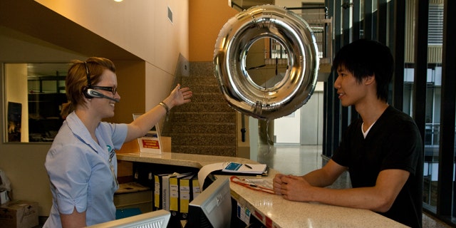 Bryan Huangs doughnut blimp helps guide visitors from reception to meeting rooms.
