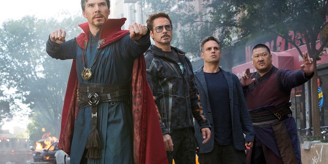 This image released by Marvel Studios shows, from left, Benedict Cumberbatch, Robert Downey Jr., Mark Ruffalo and Benedict Wong in a scene from "Avengers: Infinity War."