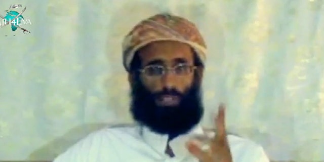 FILE: The late Anwar al-Awlaki in a 2009 video posted on YouTube