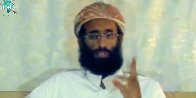 FILE: The late Anwar al-Awlaki in a 2009 video posted on YouTube