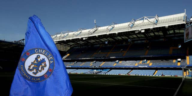 FILE - This is a Aug. 15, 2016 file photo of a corner flag at Stamford Bridge, the home of Chelsea FC in London.  A former Chelsea player says he was paid by the Premier League club to "keep a lid" on sexual abuse he suffered at the hands of its former chief scout. Gary Johnson, who is now 57, told Britain's Daily Mirror newspaper he was groomed and sexually assaulted repeatedly every week from the age of 13 until he was 16 or 17.(Nick Potts/PA via AP)