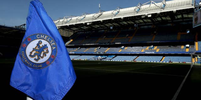 FILE - This is a Aug. 15, 2016 file photo of a corner flag at Stamford Bridge, the home of Chelsea FC in London. A former Chelsea player says he was paid by the Premier League club to "keep a lid" on sexual abuse he suffered at the hands of its former chief scout. Gary Johnson, who is now 57, told Britain's Daily Mirror newspaper he was groomed and sexually assaulted repeatedly every week from the age of 13 until he was 16 or 17.(Nick Potts/PA via AP)