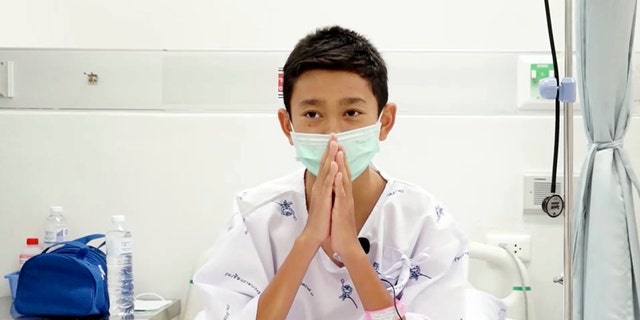 Nattavut Takhamsai, one of the 12 boys rescued from the flooded cave, in their hospital room at Chiang Rai Prachanukroh Hospital in northern Thailand.