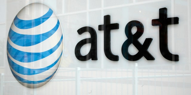 File photo: A view shows the AT&T store sign in Broomfield, Colorado April 20, 2011. (REUTERS/Rick Wilking)