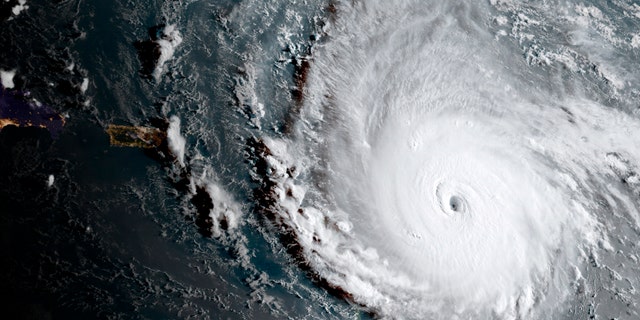 In this geocolor image captured by GOES-16 and released by the National Oceanic and Atmospheric Administration (NOAA), Hurricane Irma, a potentially catastrophic category 5 hurricane, moves westward, Tuesday morning, Sept. 5, 2017, in the Atlantic Ocean toward the Leeward Islands.