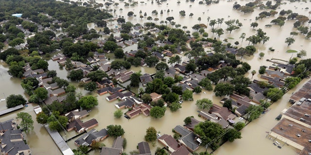A neighborhood near Addicks Reservoir is flooded by rain from Tropical Storm Harvey.