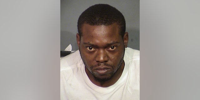 This Saturday, Oct. 15, 2016 photo provided by the Las Vegas Metro Police Department shows Kenneth McDonald, who is facing several charges including murder. Las Vegas police said he was randomly shooting at cars on the freeway when he killed a woman. (Las Vegas Metro Police Department via AP)
