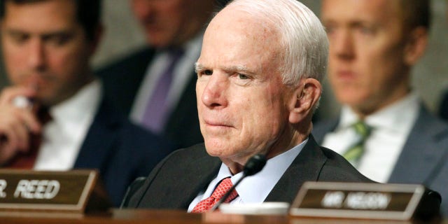 FILE - In this July 11, 2017 file photo, Senate Armed Services Committee Chairman Sen. John McCain, R-Ariz. listens on Capitol Hill in Washington, during the committee's confirmation hearing for Nay Secretary nominee Richard Spencer. Surgeons in Phoenix said they removed a blood clot from above the left eye of McCain. Mayo Clinic Hospital doctors said Saturday, July 15 that McCain underwent a "minimally invasive" procedure to remove the nearly 2-inch (5-centimeter) clot, and that the surgery went "very well." They said the 80-year-old Republican is resting comfortably at his home in Arizona. Pathology reports are expected in the next several days. (AP Photo/Jacquelyn Martin, File)