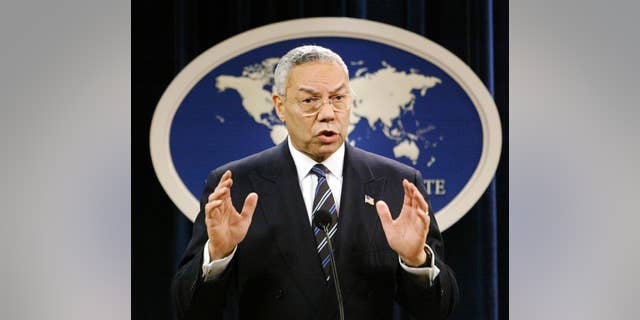 FILE - In this Jan. 8, 2004, file photo, then-Secretary of State Colin Powell speaks at a news conference in Washington at the State Department. A document circulating among White House staff says a Senate report on the CIA's interrogation and detention practices after the 9/11 attacks concludes that the agency initially kept Powell and some U.S. ambassadors in the dark about harsh techniques and secret prisons. (AP Photo/J. Scott Applewhite, File)