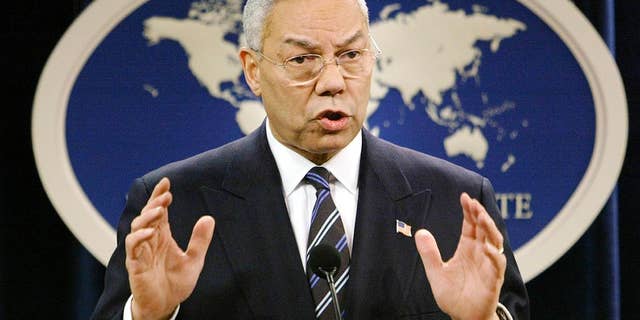 FILE - In this Jan. 8, 2004, file photo, then-Secretary of State Colin Powell speaks at a news conference in Washington at the State Department. A document circulating among White House staff says a Senate report on the CIA's interrogation and detention practices after the 9/11 attacks concludes that the agency initially kept Powell and some U.S. ambassadors in the dark about harsh techniques and secret prisons. (AP Photo/J. Scott Applewhite, File)