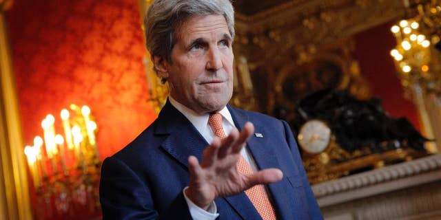 U.S. Secretary of State John Kerry speaks to journalists before a meeting with French Foreign minister Jean-Marc Ayrault, in Paris, Monday, May 9, 2016. Kerry has arrived in Paris for talks on the conflict in Syria. Representatives of Britain, Germany, Italy, Saudi Arabia, UAE, Qatar, Jordan, Turkey and the EU have also been invited in Paris Monday for a meeting in the presence of the Riad Hijab, head of the Western-backed Syrian opposition coalition, in an effort to relaunch the Syrian peace process.(AP Photo/Christophe Ena)