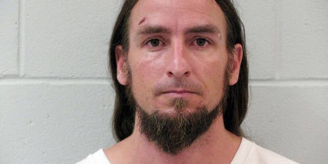 Huckleberry Finn is shown in a photo provided by the Keene, N.H. Police Department. Keene police say a man named Huckleberry Finn followed a woman into her home on July 25 and sexually assaulted her. Keene police stressed that the 36-year-old man’s real name is the same as the fictional protagonist in Mark Twain’s “Adventures of Huckleberry Finn.” He was arrested Wednesday, July 29, and was being held on $25,000 bail. (Keene, N.H. Police Department via AP)