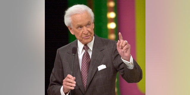**FILE**Bob Barker, 79, host of game show "The Price is Right," gestures during taping of a show on, Jan. 15, 2003, in Los Angeles. Barker has agreed to continue as host of "The Price Is Right" for a record 34th season, CBS announced Monday, Jan. 3, 2005.(AP Photo/Nick Ut)
