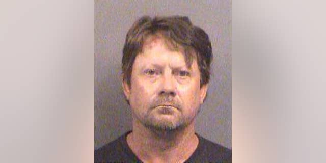 This Friday, Oct. 14, 2016 booking photo provided by the Sedgwick County Sheriff's Office in Wichita, Kan., shows Patrick Eugene Stein. Stein is one of three members of a Kansas militia group who were charged Friday Oct. 14, 2016, with plotting to bomb an apartment building filled with Somali immigrants in Garden City, Kan. Acting U.S. Attorney Tom Beall said Curtis Allen, Stein and Gavin Wright are members of a group calling itself the Kansas Security Force. Beall says the arrests were the culmination of an eight-month investigation. (Sedgwick County Sheriff's Office via AP)