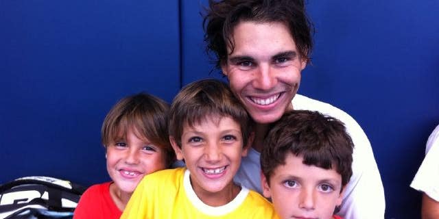 Aug 2: Rafael Nadal posted this photo of him and his three little cousins at his training center.