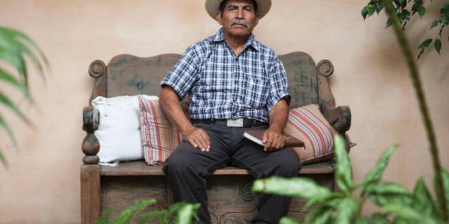 In this April 18, 2017 photo, Maya Q'eqchi leader Rodrigo Tot poses for photos during an interview in Guatemala City. Tot, a 60-year-old Guatemalan farmer and activist, has been awarded the prestigious Goldman Environmental Prize for his work in Latin America, a region where two past Latin American winners have been murdered in the last year. (AP Photo/Moises Castillo)