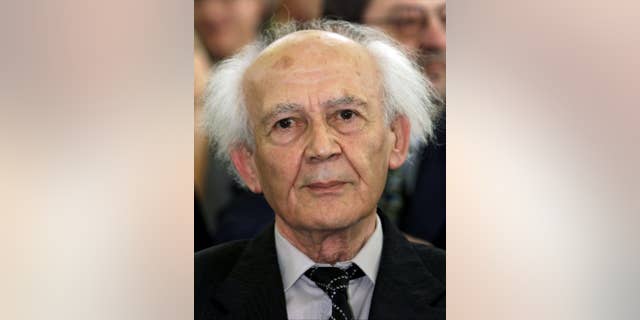 Polish sociologist Zygmunt Bauman, attends a ceremony in Frankfurt, Germany, Sunday, Sept. 13, 1998, where he received the Theodor W. Adorno-Prize. Bauman, one of the most prominent and prolific European sociologists of recent decades, has died at the age of 91. (AP Photo/Heribert Proepper)
